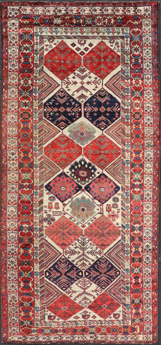 Antique Hand - Knotted Persian Bakhtiari Gallery Rug in Wool with Diamond Design This antique Persian Bakhtiari rug has been hand - knotted in wool and features an all - over sub - geometric diamond design rendered in multicolor, set upon an ivory bac... - Keivan Woven ArtsEMB - 9595 - P13521 - 15619Rug