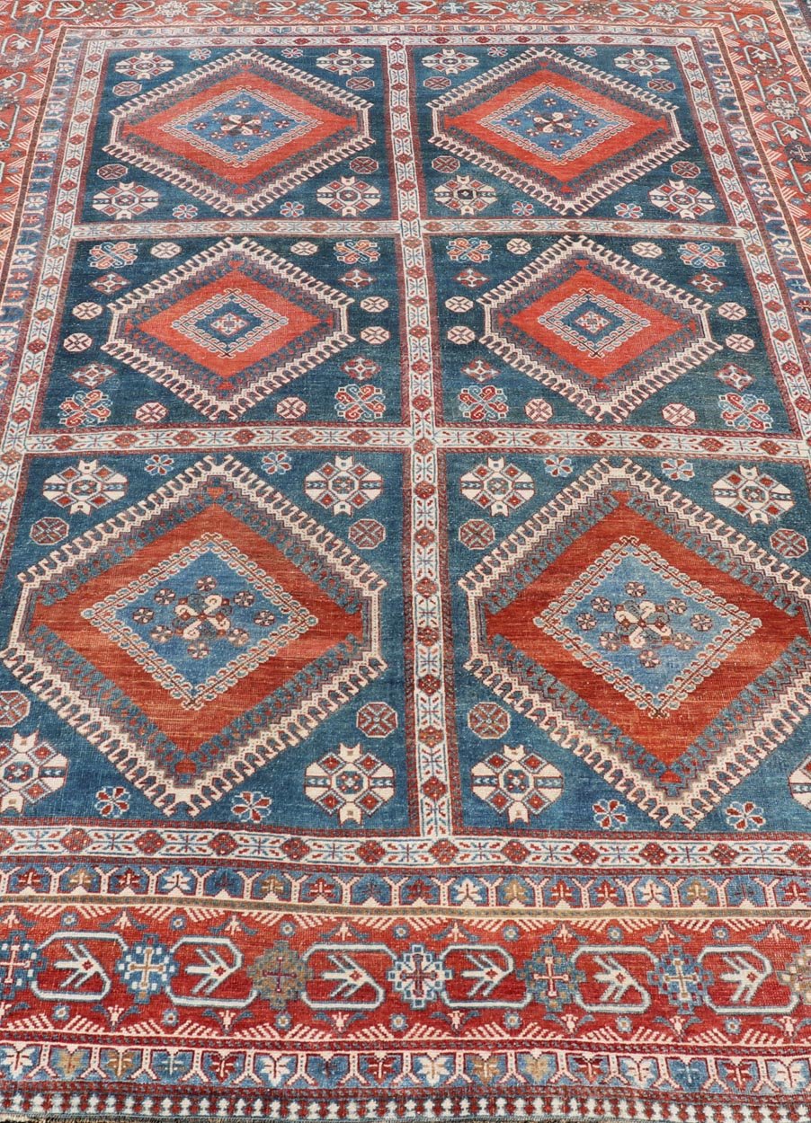 Antique Persian Shiraz Multi Medallions Rug With Geometric Design. Antique Persian Shiraz Rug with Geometric Design, Keivan Woven Arts; rug EMB - 9604 - P13873, country of origin / type: Iran / Tabriz, circa 1910. Measures: 7'2 x 10'3. Th... - Keivan Woven ArtsEMB - 9604 - P13873 - 15643Rug
