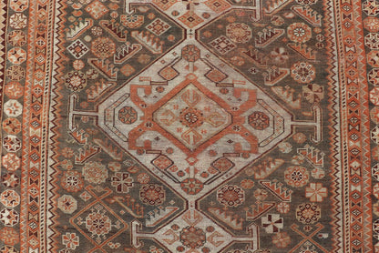 Antique Hand - Knotted Persian Shiraz in Wool with All - Over Medallion Design This antique Persian Shiraz rug has been hand - knotted in wool and features an all - over sub - geometric design rendered in multicolor. A complementary, multi - tiered border ... - Keivan Woven ArtsEMB - 9606 - P13865 - 15649Rug