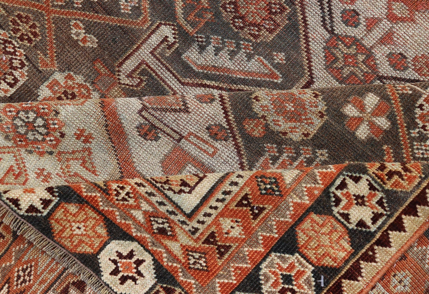 Antique Hand - Knotted Persian Shiraz in Wool with All - Over Medallion Design This antique Persian Shiraz rug has been hand - knotted in wool and features an all - over sub - geometric design rendered in multicolor. A complementary, multi - tiered border ... - Keivan Woven ArtsEMB - 9606 - P13865 - 15649Rug