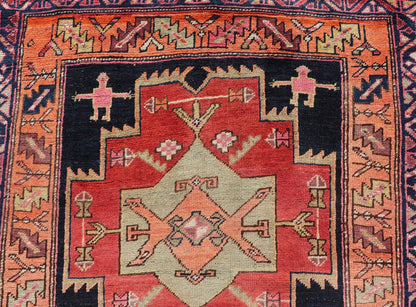Long Hand - Knotted Antique Persian Azerbaijan Runner in Wool with Medallions This antique Persian Azerbaijan styled runner has been hand - knotted in wool. The rug features a sub - geometric medallion design, and is enclosed within a complementary, ... - Keivan Woven ArtsEMB - 9608 - P13508 - 15661Rug