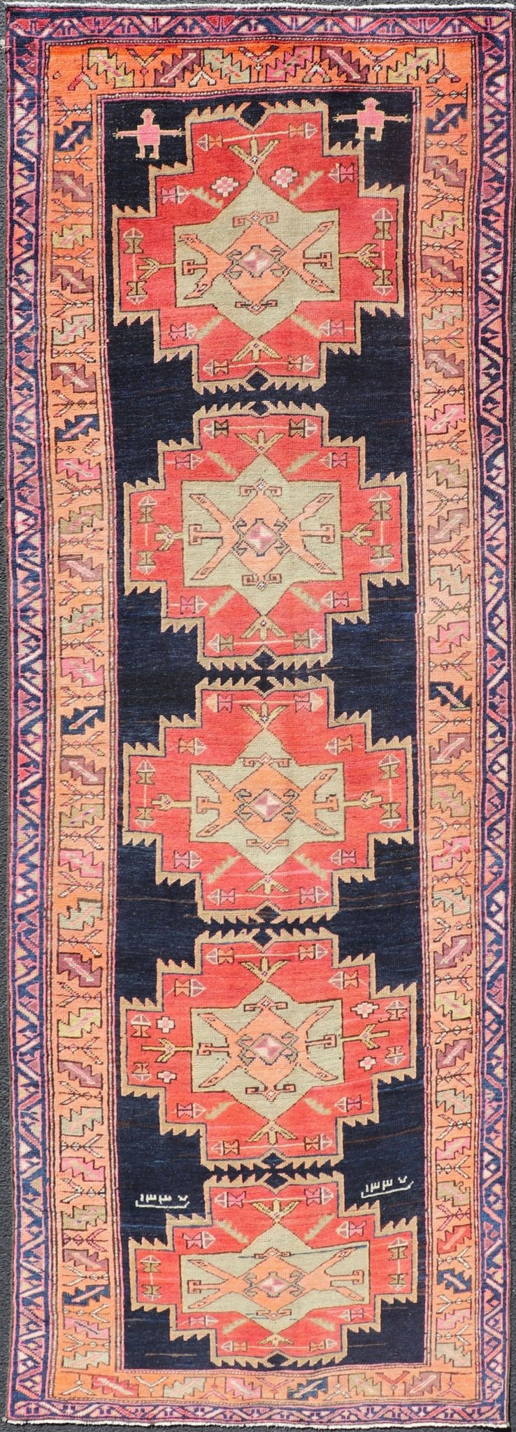 Long Hand - Knotted Antique Persian Azerbaijan Runner in Wool with Medallions This antique Persian Azerbaijan styled runner has been hand - knotted in wool. The rug features a sub - geometric medallion design, and is enclosed within a complementary, ... - Keivan Woven ArtsEMB - 9608 - P13508 - 15661