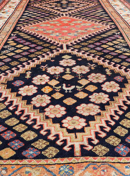 Antique Persian Tribal Shiraz in Wool with Tribal Medallion Design This antique Persian Shiraz rug has been hand - knotted in wool and features a sub - geometric tribal medallion design rendered in multicolor tones. A complementary, multi - tiered bor... - Keivan Woven ArtsEMB - 9610 - P13893 - 15929Rug