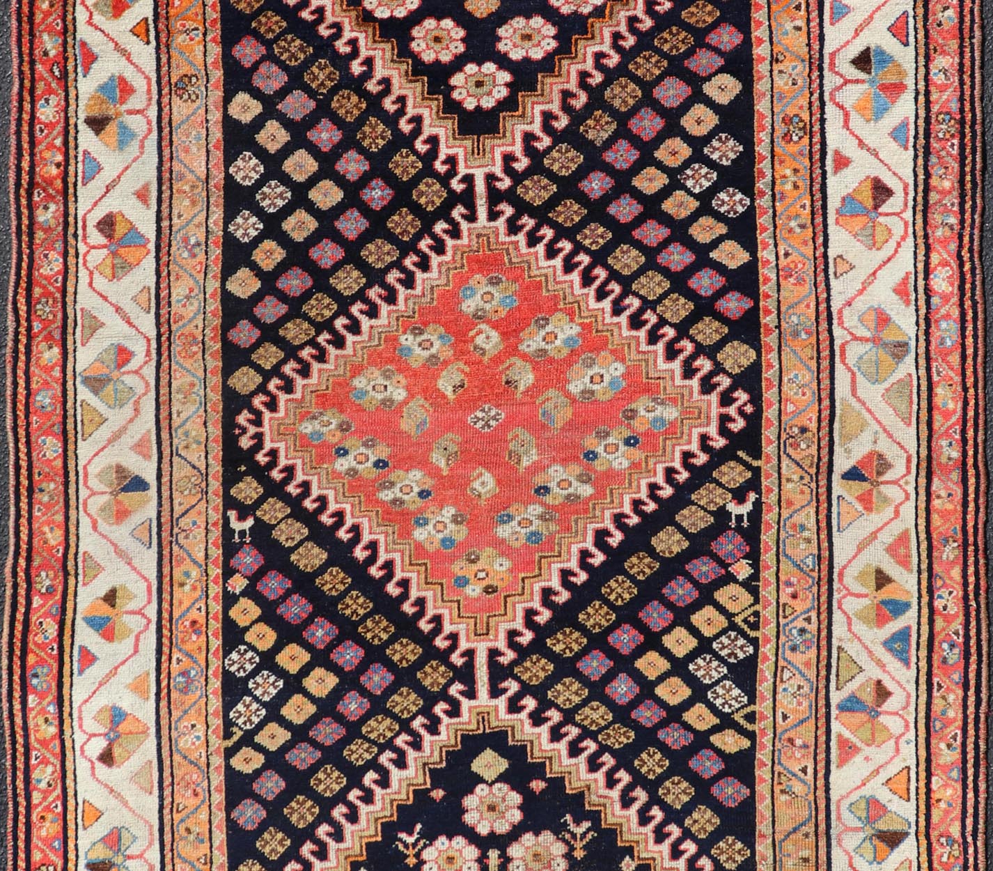 Antique Persian Tribal Shiraz in Wool with Tribal Medallion Design This antique Persian Shiraz rug has been hand - knotted in wool and features a sub - geometric tribal medallion design rendered in multicolor tones. A complementary, multi - tiered bor... - Keivan Woven ArtsEMB - 9610 - P13893 - 15929Rug