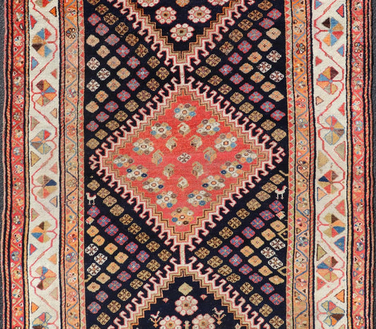 Antique Persian Tribal Shiraz in Wool with Tribal Medallion Design This antique Persian Shiraz rug has been hand - knotted in wool and features a sub - geometric tribal medallion design rendered in multicolor tones. A complementary, multi - tiered bor... - Keivan Woven ArtsEMB - 9610 - P13893 - 15929Rug