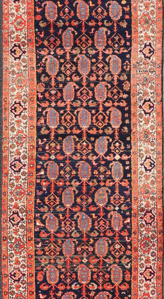 Long Antique Persian Hamadan Runner with All - Over Sub - Geometric Design Measures: 3'3 x 15'2. This 1920's Persian Hamadan runner features vivid shades of navy, blue, red - orange, green and small accents and ivory. The field design is a uniq... - Keivan Woven ArtsEMB - 9612 - P13871 - 15935Rug