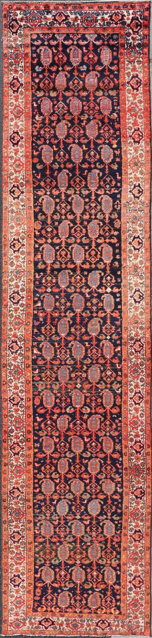 Long Antique Persian Hamadan Runner with All - Over Sub - Geometric Design Measures: 3'3 x 15'2. This 1920's Persian Hamadan runner features vivid shades of navy, blue, red - orange, green and small accents and ivory. The field design is a uniq... - Keivan Woven ArtsEMB - 9612 - P13871 - 15935Rug