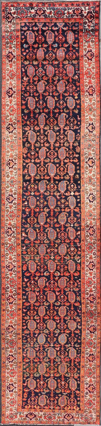 Long Antique Persian Hamadan Runner with All - Over Sub - Geometric Design Measures: 3'3 x 15'2. This 1920's Persian Hamadan runner features vivid shades of navy, blue, red - orange, green and small accents and ivory. The field design is a uniq... - Keivan Woven ArtsEMB - 9612 - P13871 - 15935Rug