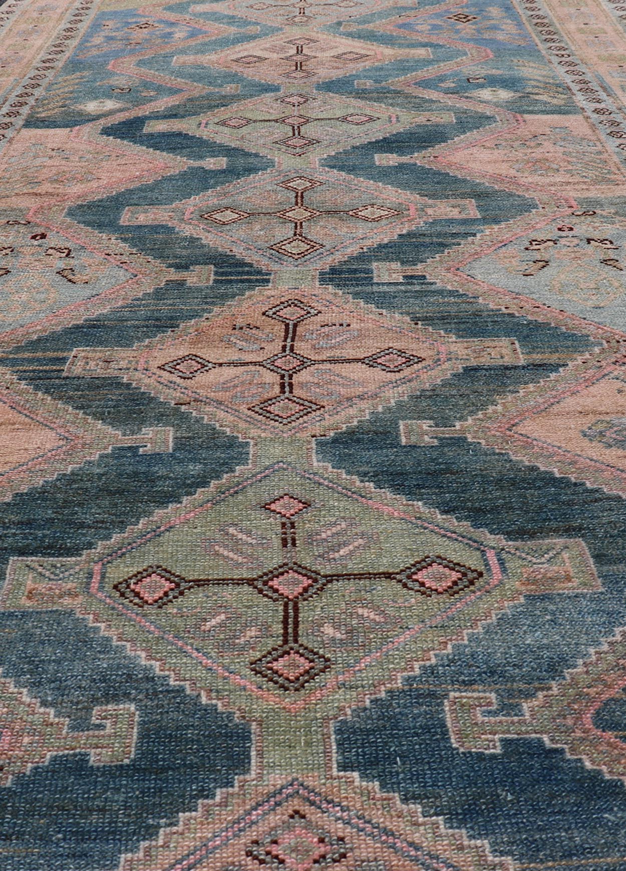 Antique Gallery Kurdish Rug in Wool with Sub - Geometric Design This antique Persian Kurdish rug has been hand - knotted in wool and features an all - over, sub - geometric medallion design rendered in multicolor. A complementary, multi - tiered border e... - Keivan Woven ArtsEMB - 9621 - P13536 - 15971Rug