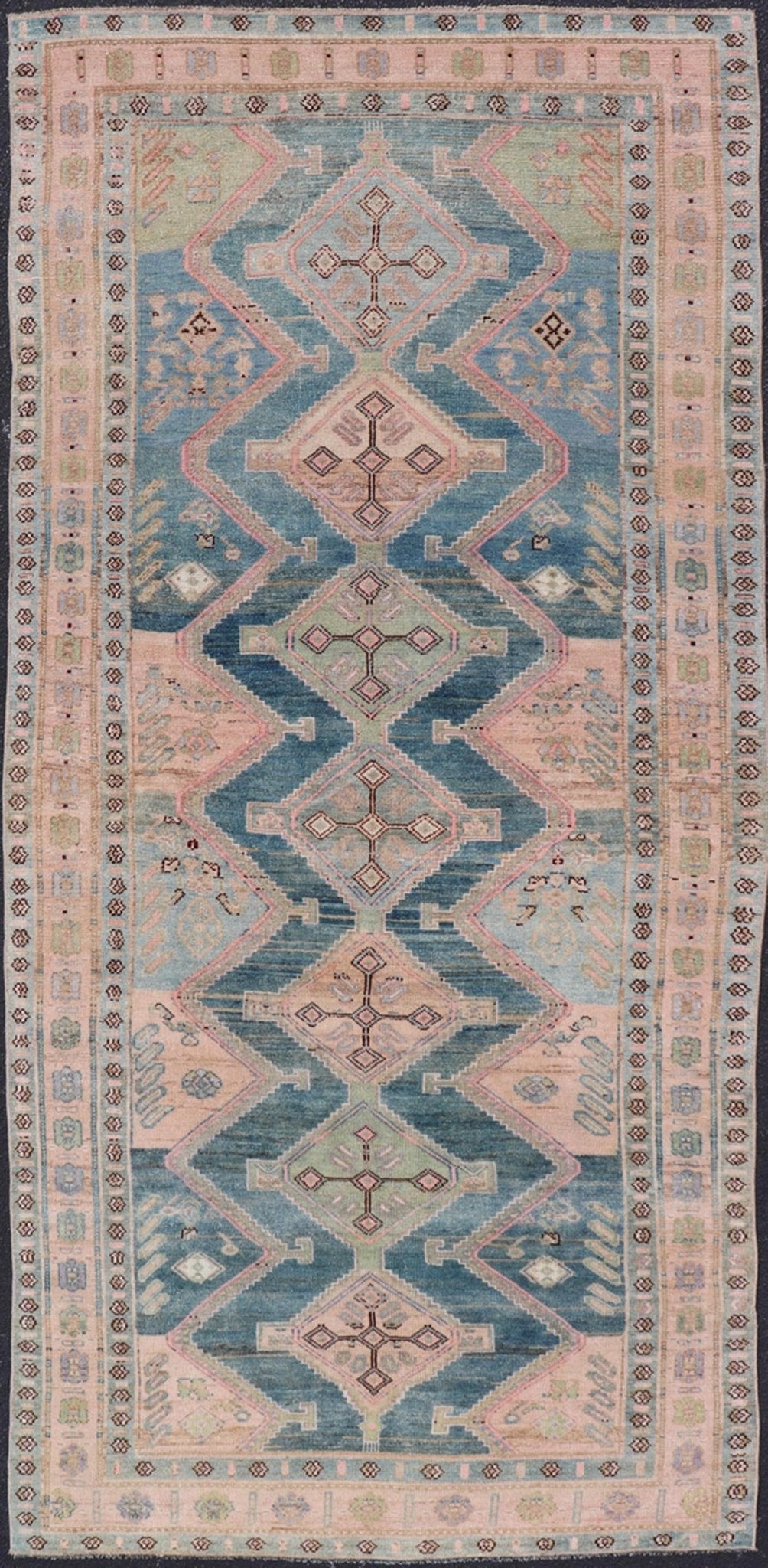 Antique Gallery Kurdish Rug in Wool with Sub - Geometric Design This antique Persian Kurdish rug has been hand - knotted in wool and features an all - over, sub - geometric medallion design rendered in multicolor. A complementary, multi - tiered border e... - Keivan Woven ArtsEMB - 9621 - P13536 - 15971Rug
