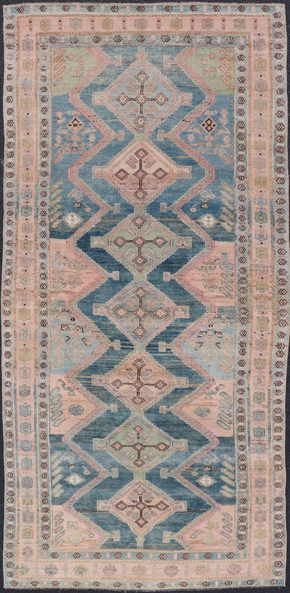 Antique Gallery Kurdish Rug in Wool with Sub - Geometric Design This antique Persian Kurdish rug has been hand - knotted in wool and features an all - over, sub - geometric medallion design rendered in multicolor. A complementary, multi - tiered border e... - Keivan Woven ArtsEMB - 9621 - P13536 - 15971Rug