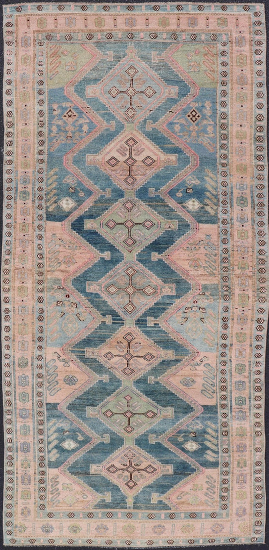 Antique Gallery Kurdish Rug in Wool with Sub - Geometric Design This antique Persian Kurdish rug has been hand - knotted in wool and features an all - over, sub - geometric medallion design rendered in multicolor. A complementary, multi - tiered border e... - Keivan Woven ArtsEMB - 9621 - P13536 - 15971Rug