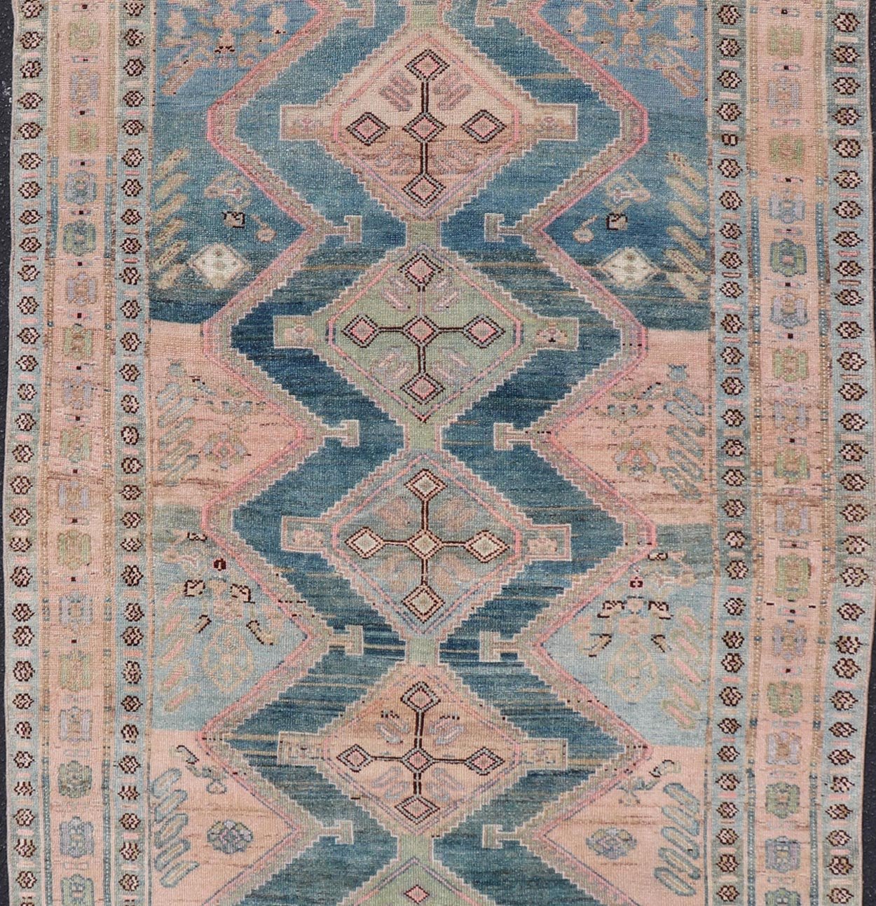 Antique Gallery Kurdish Rug in Wool with Sub - Geometric Design This antique Persian Kurdish rug has been hand - knotted in wool and features an all - over, sub - geometric medallion design rendered in multicolor. A complementary, multi - tiered border e... - Keivan Woven ArtsEMB - 9621 - P13536 - 15971Rug