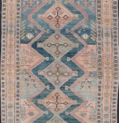 Antique Gallery Kurdish Rug in Wool with Sub - Geometric Design This antique Persian Kurdish rug has been hand - knotted in wool and features an all - over, sub - geometric medallion design rendered in multicolor. A complementary, multi - tiered border e... - Keivan Woven ArtsEMB - 9621 - P13536 - 15971Rug