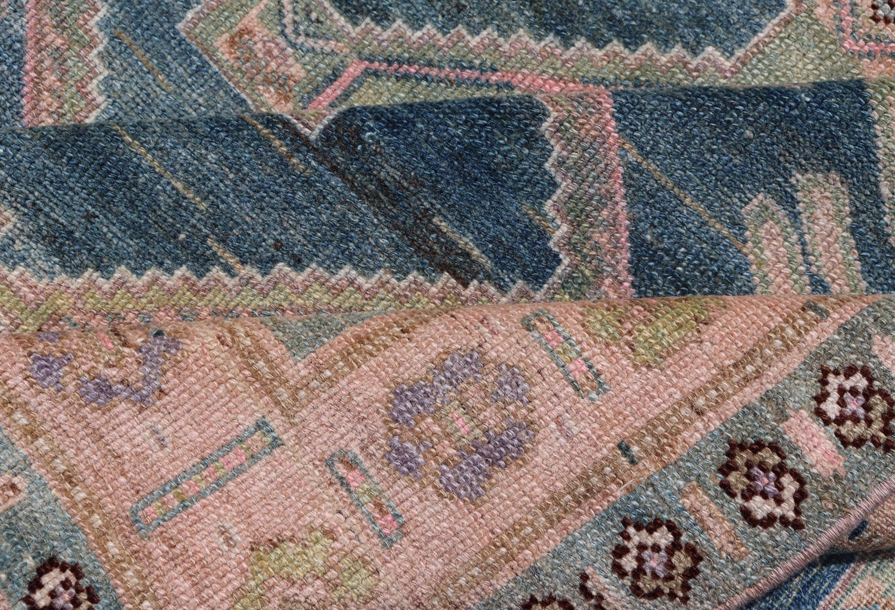 Antique Gallery Kurdish Rug in Wool with Sub - Geometric Design This antique Persian Kurdish rug has been hand - knotted in wool and features an all - over, sub - geometric medallion design rendered in multicolor. A complementary, multi - tiered border e... - Keivan Woven ArtsEMB - 9621 - P13536 - 15971Rug