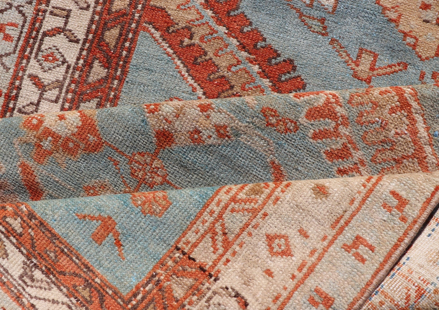 Hand - Knotted Antique Persian Karajeh Runner with Sub - Geometric Tribal Medallions This antique Persian Karajeh runner features a tribal sub - geometric triple medallion design rendered in multicolor, set upon a blue background. A complementary, mu... - Keivan Woven ArtsEMB - 9625 - P13570 - 15989Rug