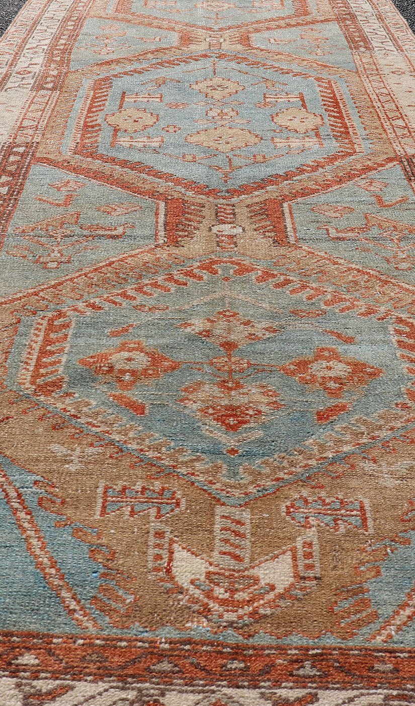 Hand - Knotted Antique Persian Karajeh Runner with Sub - Geometric Tribal Medallions This antique Persian Karajeh runner features a tribal sub - geometric triple medallion design rendered in multicolor, set upon a blue background. A complementary, mu... - Keivan Woven ArtsEMB - 9625 - P13570 - 15989Rug