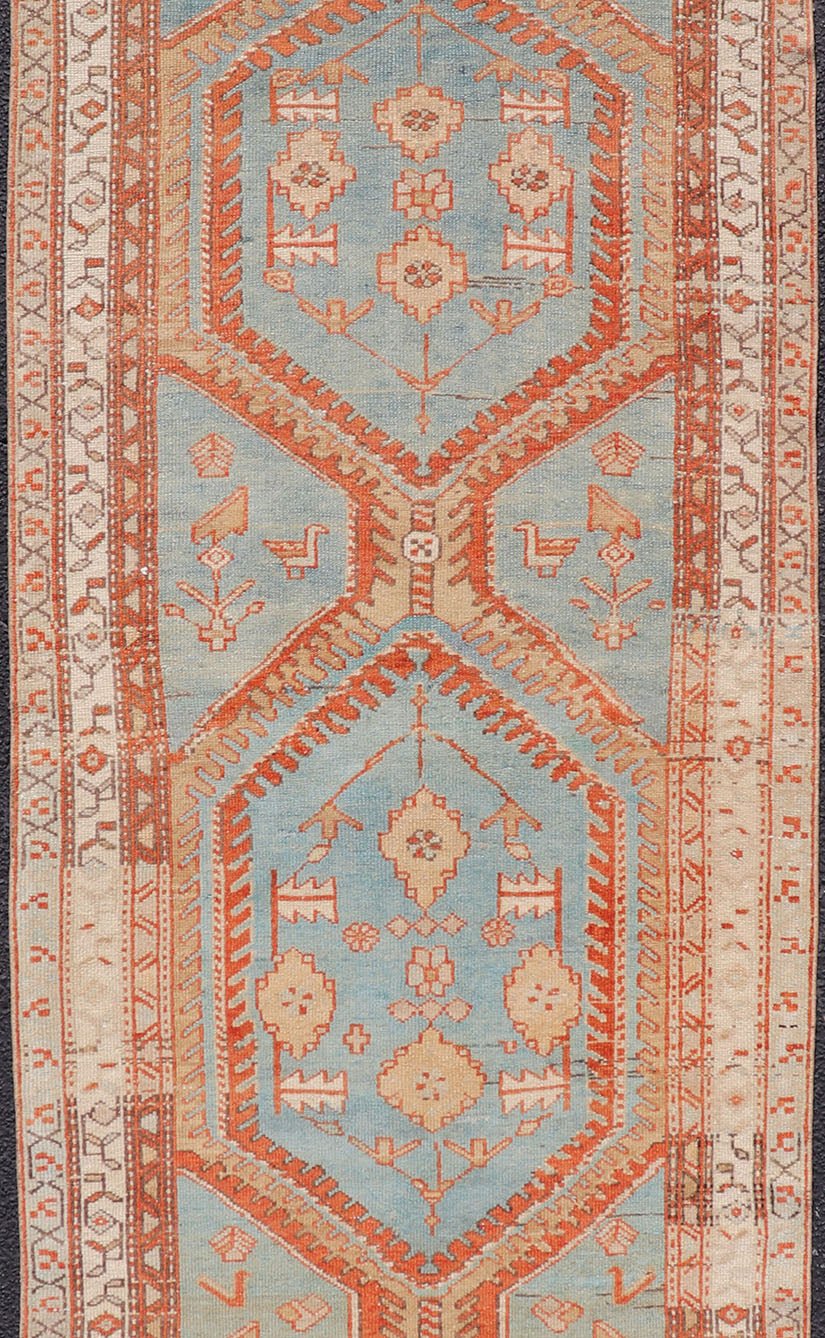 Hand - Knotted Antique Persian Karajeh Runner with Sub - Geometric Tribal Medallions This antique Persian Karajeh runner features a tribal sub - geometric triple medallion design rendered in multicolor, set upon a blue background. A complementary, mu... - Keivan Woven ArtsEMB - 9625 - P13570 - 15989Rug