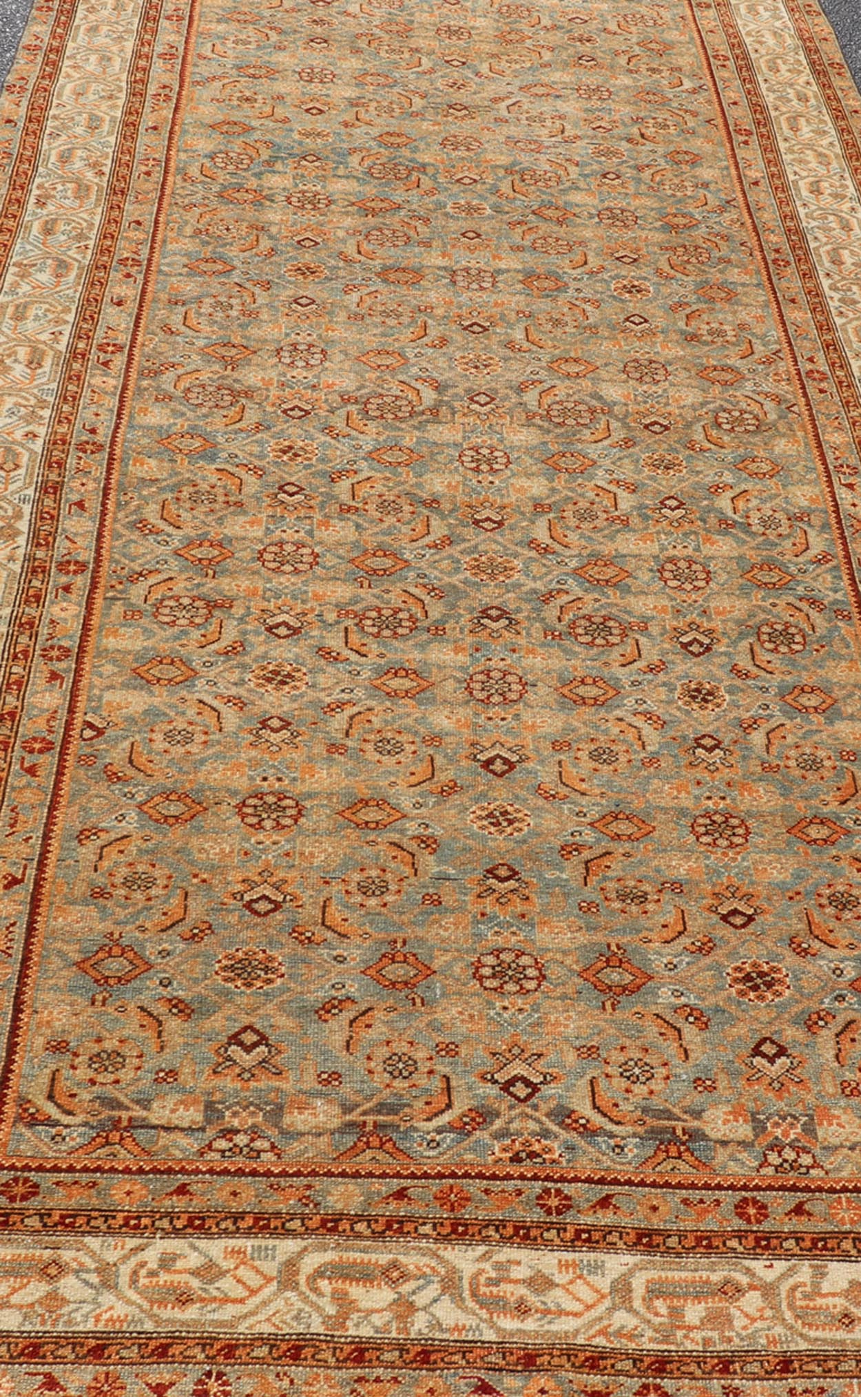 Antique Kurdish Gallery Rug With All - Over Geometric Design Measures: 5'8 x 14'0 This antique Persian Kurdish gallery rug is filled with eccentric colors and details. The multi - tiered border features nature motifs rendered in the same col... - Keivan Woven ArtsEMB - 9626 - P13879 - 15995Rug