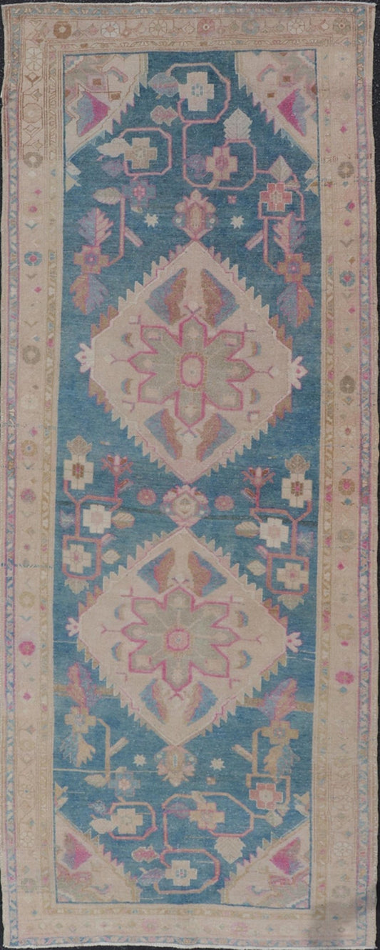 Antique Persian Gallery Mahal Rug in Wool with Floral Medallion Design This antique Persian gallery Mahal rug has been hand - knotted in wool and features an all - over sub - geometric floral design rendered in blue, green, pink and neutral tones. A ... - Keivan Woven ArtsEMB - 9627 - P13892 - 16001Rug