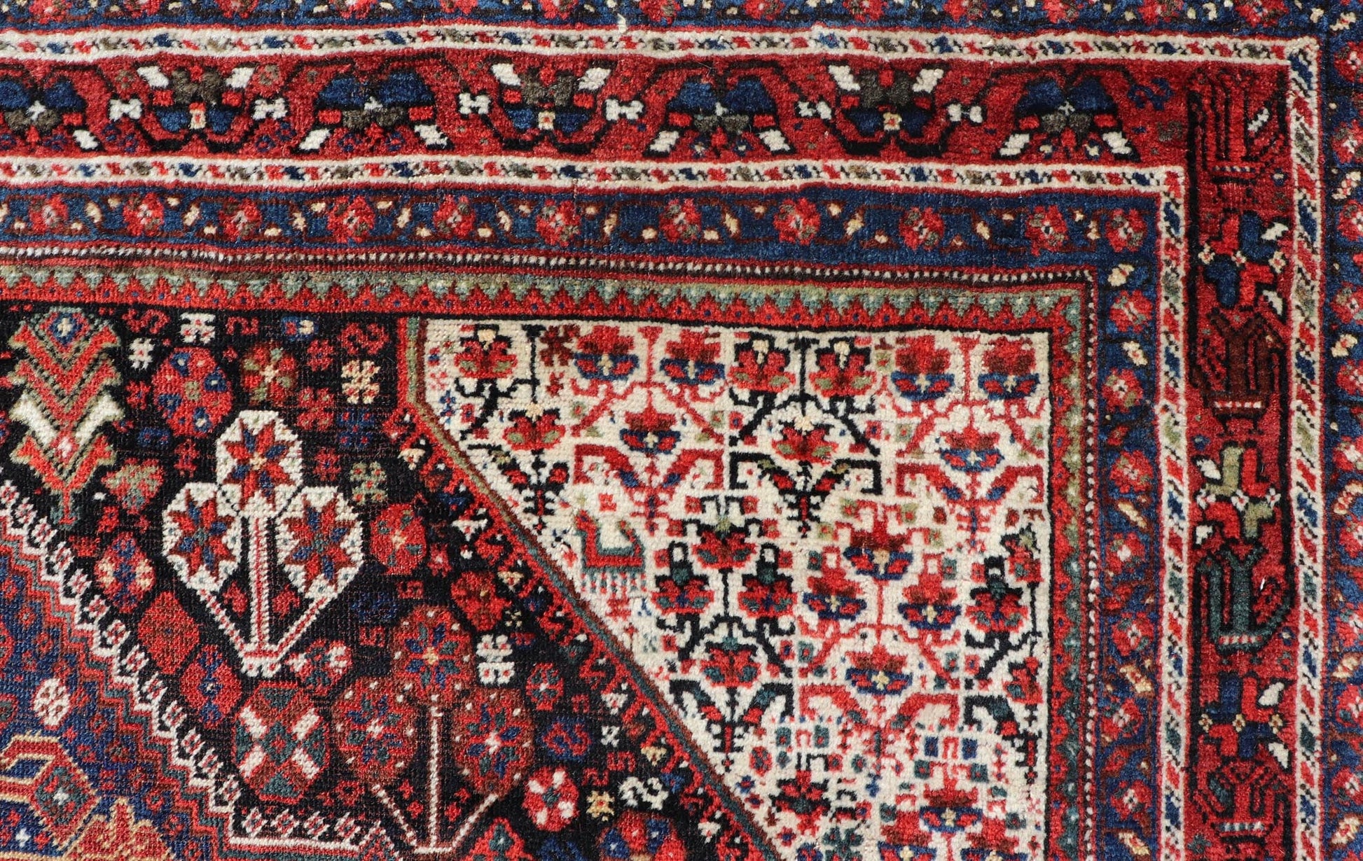 Antique Hand - Knotted Persian Qashqai Rug in Wool with All - Over Tribal Design This antique Persian Qashqai rug has been hand - knotted in wool and features an all - over sub - geometric design rendered in multicolor. A complementary, multi - tiered borde... - Keivan Woven ArtsEMB - 9628 - P13856 - 16007Rug