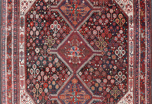Antique Hand - Knotted Persian Qashqai Rug in Wool with All - Over Tribal Design This antique Persian Qashqai rug has been hand - knotted in wool and features an all - over sub - geometric design rendered in multicolor. A complementary, multi - tiered borde... - Keivan Woven ArtsEMB - 9628 - P13856 - 16007Rug