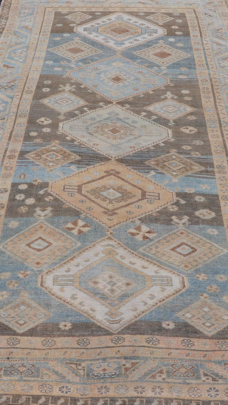 Antique Persian Kurdish Rug with All - Over Geometrics by Keivan Woven Arts. Measures: 5'4 x 10'5 Softly colored antique Persian Gallery Kurdish rug with all - over geometric and diamond design. Keivan Woven Arts / rug EMB - 9634 - P1386... - Keivan Woven ArtsEMB - 9634 - P13861 - 14892Rug