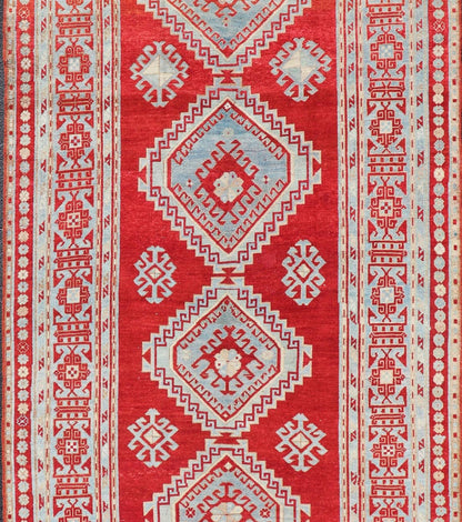 Antique Caucasian Kazak Gallery Rug in Brilliant Red with Geometric Design Tribal geometric medallion design Kazak antique rug, antique Caucasian from Caucasus Region with a beautiful red background in multi - colors, Keivan Woven Arts / rug E... - Keivan Woven ArtsEMB - 9637 - P13567 - 16037Rug