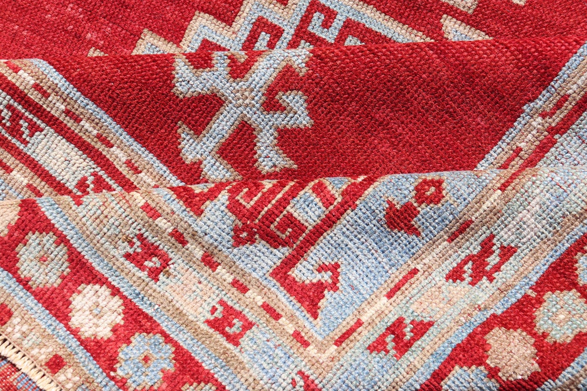 Antique Caucasian Kazak Gallery Rug in Brilliant Red with Geometric Design Tribal geometric medallion design Kazak antique rug, antique Caucasian from Caucasus Region with a beautiful red background in multi - colors, Keivan Woven Arts / rug E... - Keivan Woven ArtsEMB - 9637 - P13567 - 16037Rug
