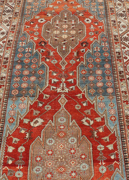 Antique Hamadan Gallery Rug with Geometric Medallions in Red, Blue and Brown This unique Persian Hamadan Gallery rug features an exquisite design composed of a vertical arrangement of red and brown geometric medallions surrounded by a variety of... - Keivan Woven ArtsEMB - 9639 - P13857 - 16043Rug