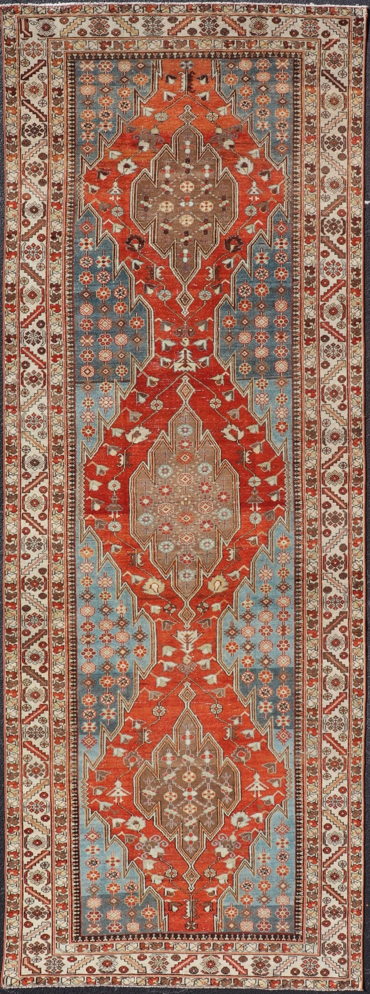 Antique Hamadan Gallery Rug with Geometric Medallions in Red, Blue and Brown This unique Persian Hamadan Gallery rug features an exquisite design composed of a vertical arrangement of red and brown geometric medallions surrounded by a variety of... - Keivan Woven ArtsEMB - 9639 - P13857 - 16043Rug