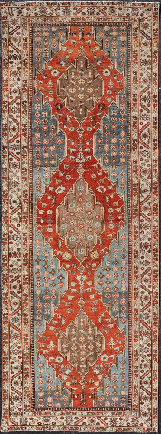 Antique Hamadan Gallery Rug with Geometric Medallions in Red, Blue and Brown This unique Persian Hamadan Gallery rug features an exquisite design composed of a vertical arrangement of red and brown geometric medallions surrounded by a variety of... - Keivan Woven ArtsEMB - 9639 - P13857 - 16043Rug