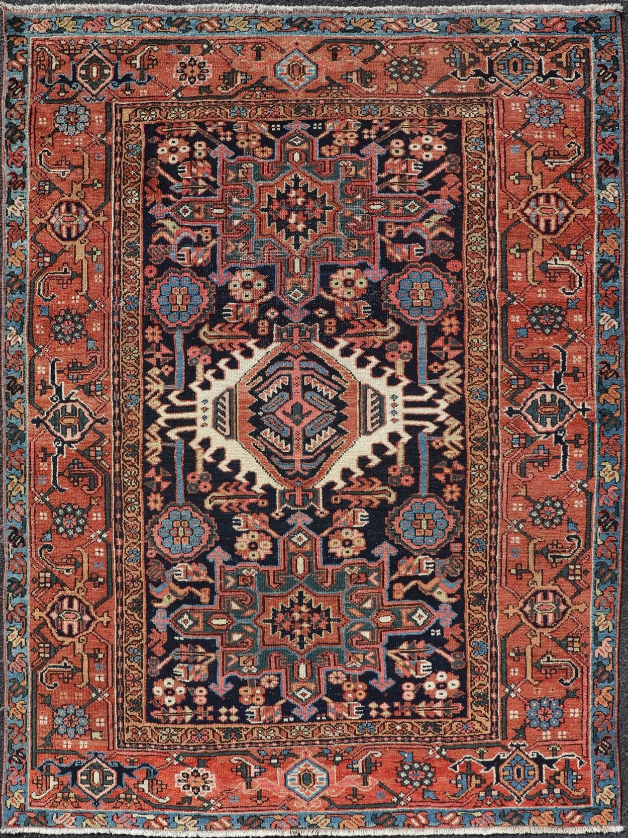 Antique Persian Heriz with Medallion Design in Ivory, Dark Blue & Jewel Tones This lovely Antique Heriz rug, hailing from northwestern Iran (circa 1920s), features a central medallion design surrounded by exquisitely defined geometric motifs. Th... - Keivan Woven ArtsEMB - 9641 - P13855 - 16055Rug
