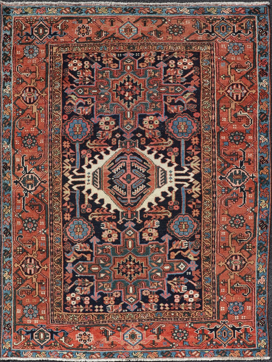 Antique Persian Heriz with Medallion Design in Ivory, Dark Blue & Jewel Tones This lovely Antique Heriz rug, hailing from northwestern Iran (circa 1920s), features a central medallion design surrounded by exquisitely defined geometric motifs. Th... - Keivan Woven ArtsEMB - 9641 - P13855 - 16055Rug