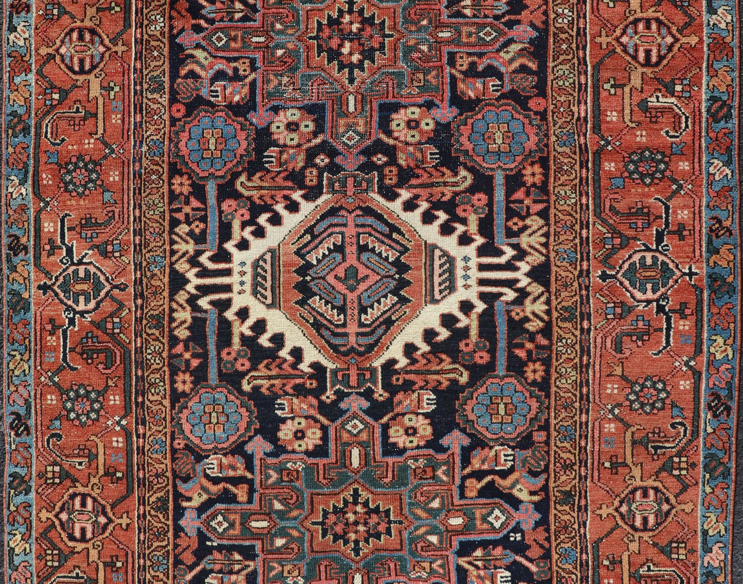 Antique Persian Heriz with Medallion Design in Ivory, Dark Blue & Jewel Tones This lovely Antique Heriz rug, hailing from northwestern Iran (circa 1920s), features a central medallion design surrounded by exquisitely defined geometric motifs. Th... - Keivan Woven ArtsEMB - 9641 - P13855 - 16055Rug