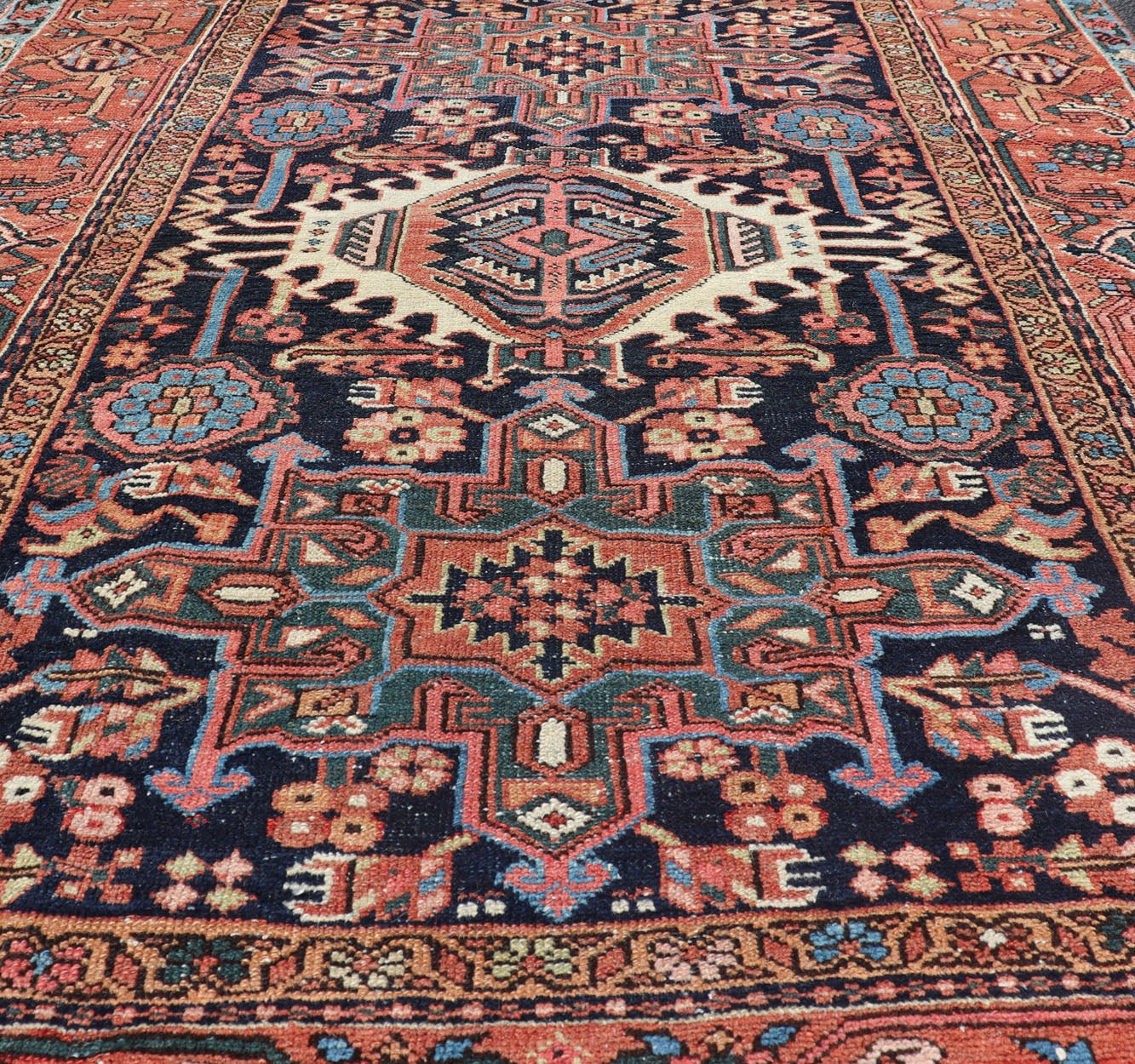 Antique Persian Heriz with Medallion Design in Ivory, Dark Blue & Jewel Tones This lovely Antique Heriz rug, hailing from northwestern Iran (circa 1920s), features a central medallion design surrounded by exquisitely defined geometric motifs. Th... - Keivan Woven ArtsEMB - 9641 - P13855 - 16055Rug