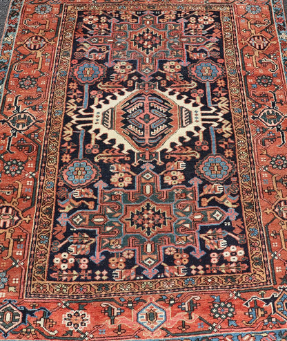 Antique Persian Heriz with Medallion Design in Ivory, Dark Blue & Jewel Tones This lovely Antique Heriz rug, hailing from northwestern Iran (circa 1920s), features a central medallion design surrounded by exquisitely defined geometric motifs. Th... - Keivan Woven ArtsEMB - 9641 - P13855 - 16055Rug