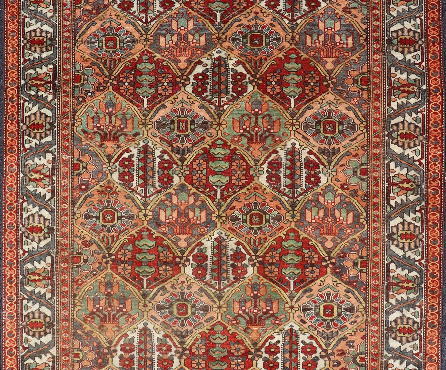 Antique Persian Diamond Garden Design Bakhtiari Rug in Multi Colors All - over diamond design antique Persian Bakhtiari Garden rug in coral, blue, green, ivory, tan, gold, rug EMB - 9643 - P13572, country of origin / type: Iran / Bakhtiari, circa 1920... - Keivan Woven ArtsEMB - 9643 - P13572 - 16067Rug