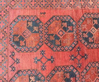 Hand - Knotted Turkomen Ersari Rug in Wool with Gul Design in Red, Orange and Blue This Turkomen Ersari rug has been hand - knotted in the finest wool. The rug features a repeating Gul design throughout the entirety of the rug, enclosed within a co... - Keivan Woven ArtsEMB - 9644 - P13547 - 16073Rug