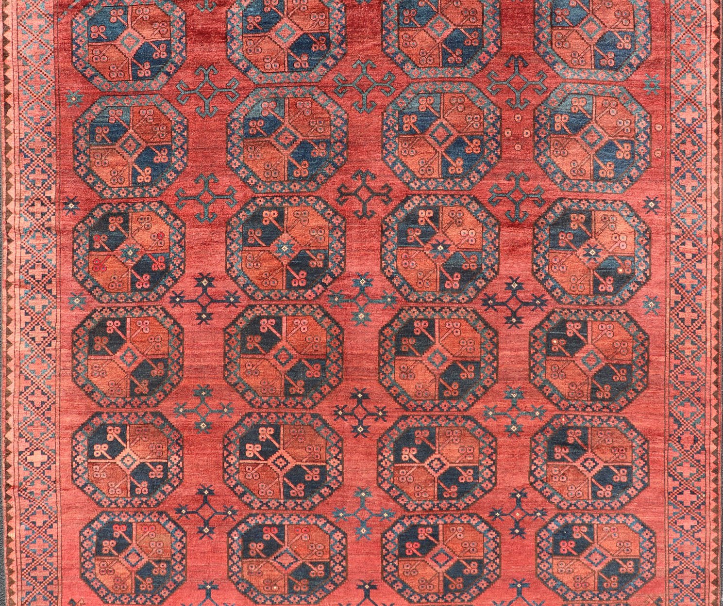 Hand - Knotted Turkomen Ersari Rug in Wool with Gul Design in Red, Orange and Blue This Turkomen Ersari rug has been hand - knotted in the finest wool. The rug features a repeating Gul design throughout the entirety of the rug, enclosed within a co... - Keivan Woven ArtsEMB - 9644 - P13547 - 16073Rug