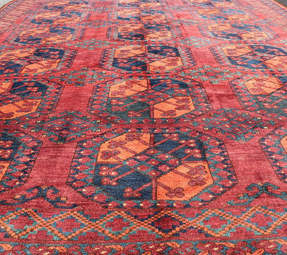 Square Sized Hand - Knotted Turkomen Ersari Rug in Wool with Repeating Gul Design This Turkomen Ersari rug has been hand - knotted in the finest wool. The rug features a repeating sub - geometric Gul design throughout the entirety of the rug, enclose... - Keivan Woven ArtsEMB - 9645 - P13551 - 16079Rug