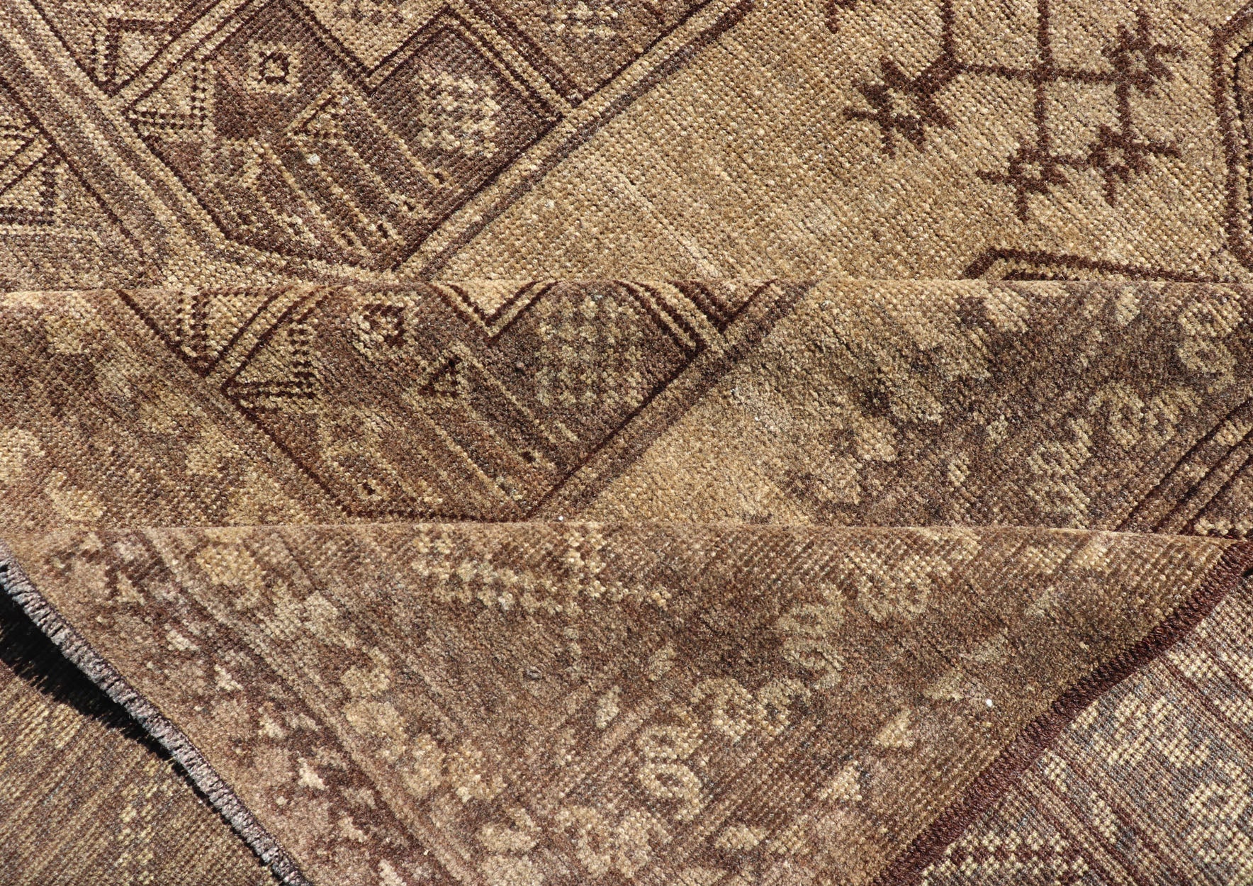 Hand - Knotted Turkomen Ersari Rug in Wool with Gul Design in Brown, Tan and Taupe This Turkomen Ersari rug has been hand - knotted in the finest wool. The rug features an all - over repeating Gul design throughout the entirety of the rug, enclosed w... - Keivan Woven ArtsEMB - 9647 - P13549 - 16091Rug