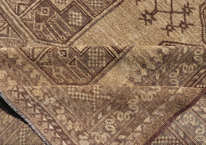 Hand - Knotted Turkomen Ersari Rug in Wool with Gul Design in Brown, Tan and Taupe This Turkomen Ersari rug has been hand - knotted in the finest wool. The rug features an all - over repeating Gul design throughout the entirety of the rug, enclosed w... - Keivan Woven ArtsEMB - 9647 - P13549 - 16091Rug