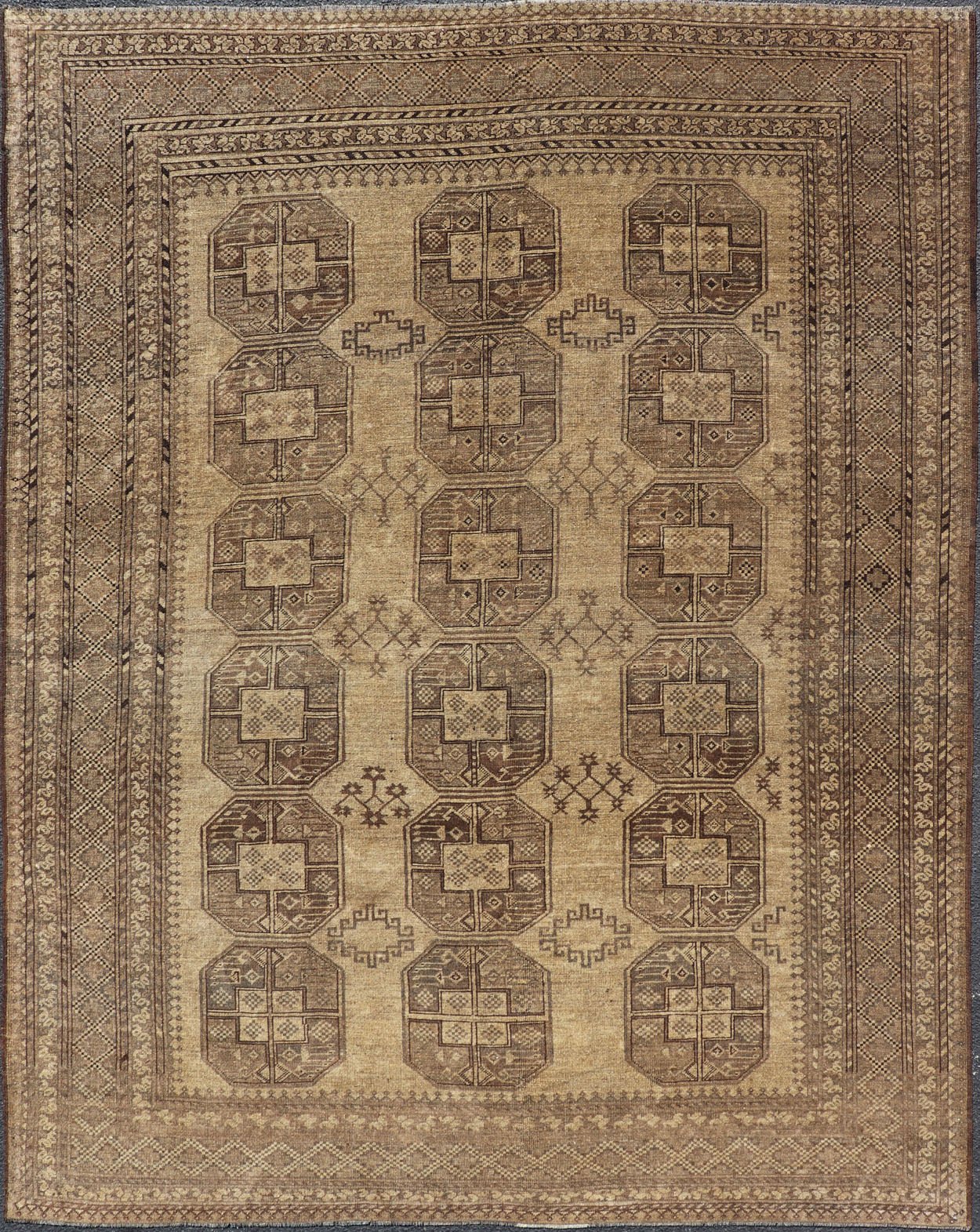 Hand - Knotted Turkomen Ersari Rug in Wool with Gul Design in Brown, Tan and Taupe This Turkomen Ersari rug has been hand - knotted in the finest wool. The rug features an all - over repeating Gul design throughout the entirety of the rug, enclosed w... - Keivan Woven ArtsEMB - 9647 - P13549 - 16091Rug