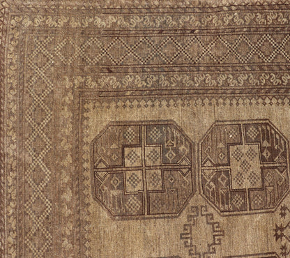 Hand - Knotted Turkomen Ersari Rug in Wool with Gul Design in Brown, Tan and Taupe This Turkomen Ersari rug has been hand - knotted in the finest wool. The rug features an all - over repeating Gul design throughout the entirety of the rug, enclosed w... - Keivan Woven ArtsEMB - 9647 - P13549 - 16091Rug