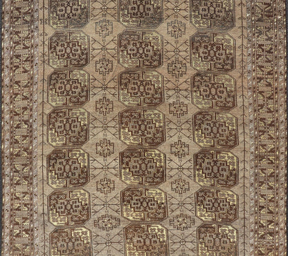 Hand - Knotted Turkomen Ersari Rug in Wool with Repeating Sub - Geometric Gul Design This Turkomen Ersari rug has been hand - knotted in the finest wool. The rug features a repeating Gul design throughout the entirety of the rug, enclosed within a co... - Keivan Woven ArtsEMB - 9649 - P13543 - 16103Rug