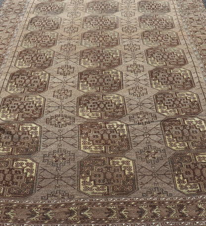 Hand - Knotted Turkomen Ersari Rug in Wool with Repeating Sub - Geometric Gul Design This Turkomen Ersari rug has been hand - knotted in the finest wool. The rug features a repeating Gul design throughout the entirety of the rug, enclosed within a co... - Keivan Woven ArtsEMB - 9649 - P13543 - 16103Rug