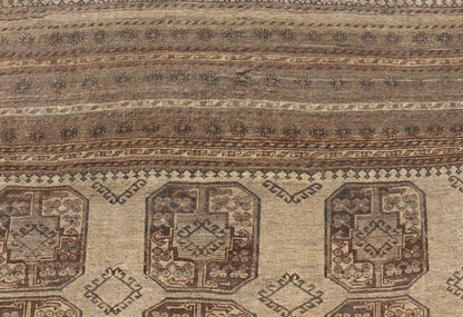 Square Sized Hand - Knotted Turkomen Ersari Rug in Wool with Repeating Gul Design This square sized Ersari rug has been hand - knotted in the finest wool. The rug features an all - over sub - geometric repeating Gul design throughout the entirety of th... - Keivan Woven ArtsEMB - 9651 - P13595 - 16115Rug