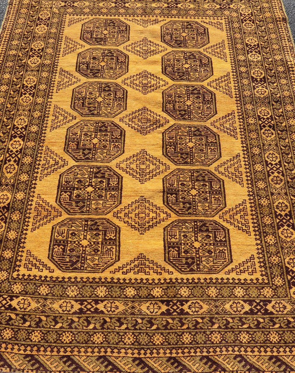 Hand - Knotted Ersari Rug in Wool with Gul Design in Green, Marigold and Brown This Turkomen Ersari rug has been hand - knotted in the finest wool. The rug features an all - over repeating Gul design throughout the entirety of the rug, enclosed within... - Keivan Woven ArtsEMB - 9654 - P13593 - 16127Rug