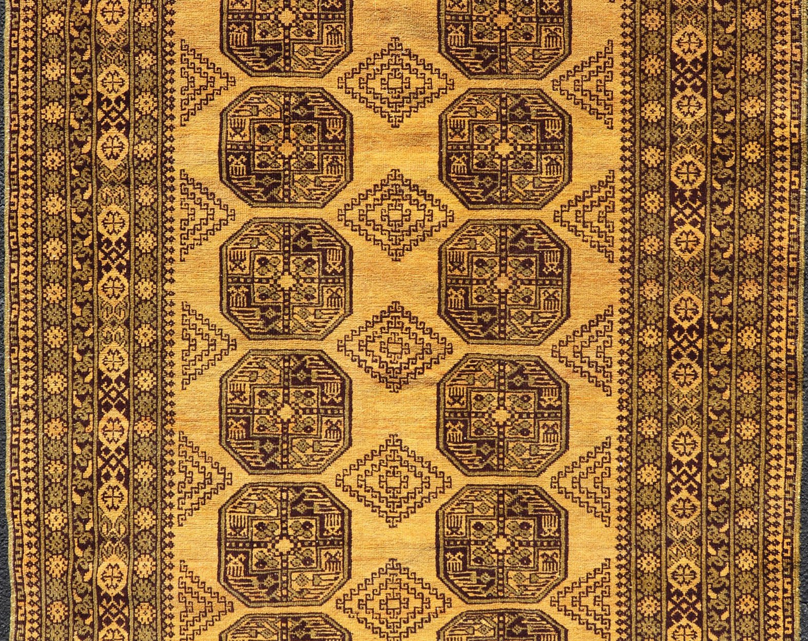 Hand - Knotted Ersari Rug in Wool with Gul Design in Green, Marigold and Brown This Turkomen Ersari rug has been hand - knotted in the finest wool. The rug features an all - over repeating Gul design throughout the entirety of the rug, enclosed within... - Keivan Woven ArtsEMB - 9654 - P13593 - 16127Rug